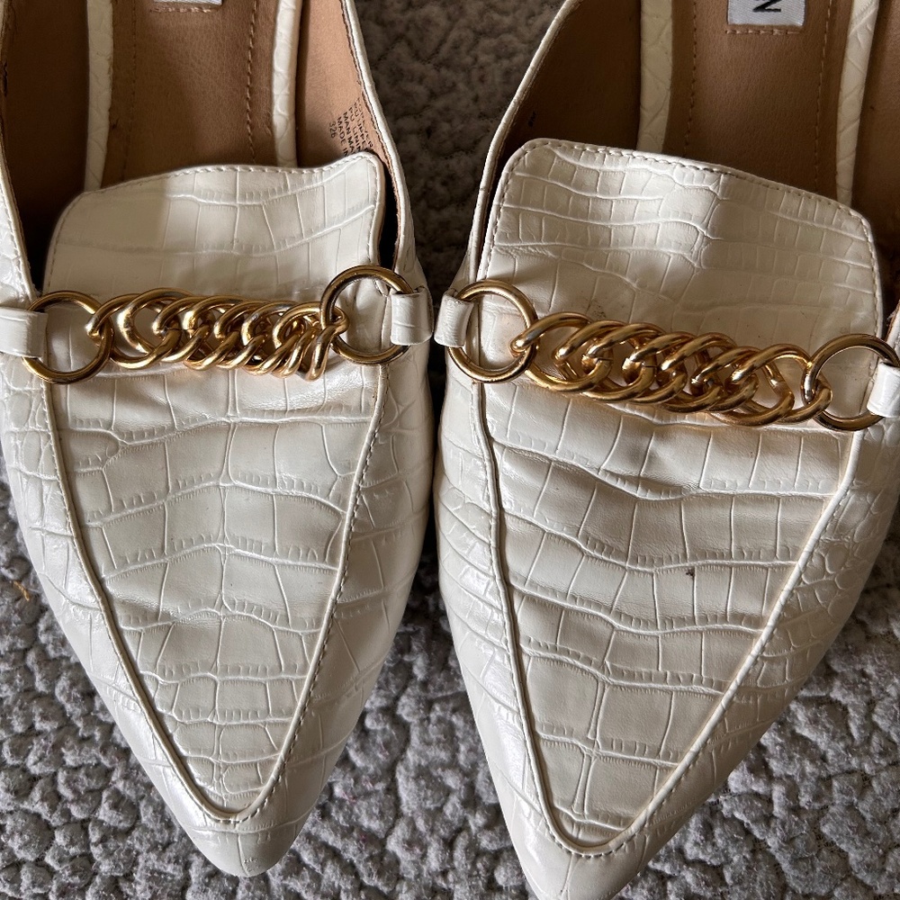 White faux leather mules